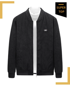Detail of black corduroy jacket with Free Spirit patch and durable metal zipper closure