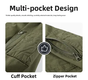 Detailed macro view of utility sleeve pockets and metal zipper on cotton jacket