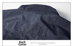 Detailed close-up of reinforced neck stitching on navy blue quick-dry outdoor vest