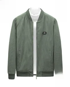 Detailed view of olive green corduroy jacket with embroidered Free Spirit chest badge
