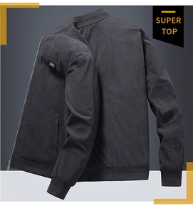 Detail of dark grey corduroy jacket featuring metal zipper and Free Spirit logo patch