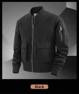 Detailed view of black cotton bomber jacket with utility pockets and ribbed collar