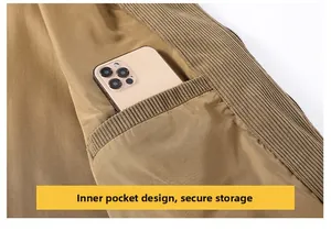 Detail view of the inner pocket on a corduroy jacket, designed for secure phone storage