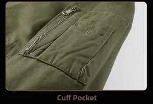 Detail view of cotton flight jacket sleeve with utility zipper pocket and pen slots