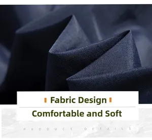 Dettaglio ravvicinato del morbido tessuto twill blu scuro con trama intrecciata