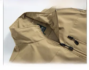 Detail of khaki fishing vest featuring a windproof stand-up collar and breathable mesh lining