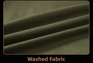 Detailed close-up of olive green washed cotton fabric with twill texture for bomber jackets
