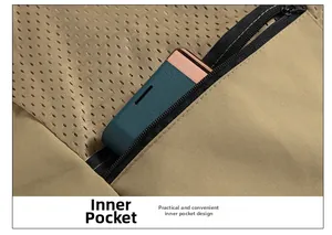 Detail of the khaki outdoor vest featuring a secure zippered inner pocket with mesh lining