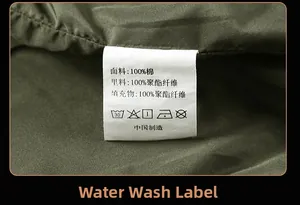 Detailed wash label of the cotton jacket showing 100% cotton fabric and material info