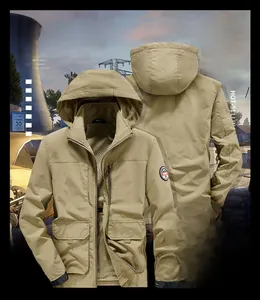 Macro shot of khaki corduroy jacket featuring detachable hood and zip pocket detail
