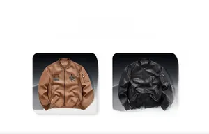 Detailed embroidery and functional sleeve pocket on a vintage faux leather bomber jacket