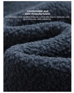 Macro close-up of soft grey polar fleece fabric showing thick and warm fiber texture