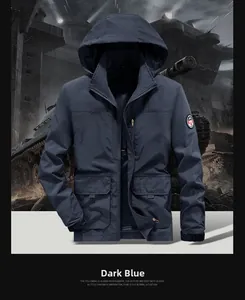 Detail of a dark blue windproof outdoor jacket with a detachable hood and zip pockets