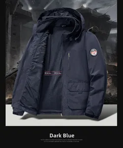 Detail of windproof hooded jacket showing breathable mesh lining and tactical chest pocket