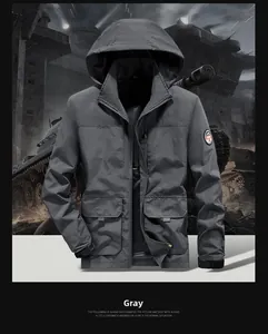 Detail of grey tactical jacket featuring large cargo pockets and windproof hood design
