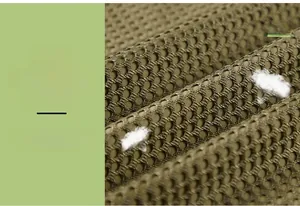 Makroansicht von braunem, atmungsaktivem Mesh-Gewebe für Outdoor-Angelwesten-Material