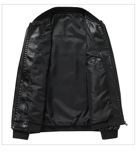 Detail of black PU leather jacket showing smooth inner lining and functional inside pocket