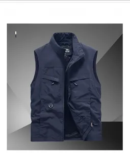 Detail of navy blue multi-pocket outdoor vest with stand collar and breathable mesh lining