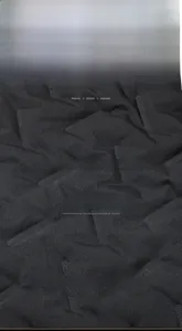 Detail of thermal heat-shrink fabric with 3D rectangular texture on men vest