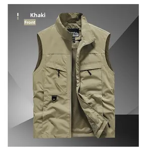 Detail of khaki outdoor vest showing zipper pockets, D-ring and breathable mesh lining