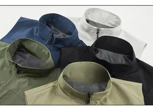 Detail view of multi-color fishing vests with breathable mesh lining and stand-up collar