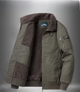 Detail of army green bomber jacket featuring a warm gray sherpa collar and utility sleeve pocket