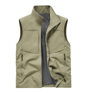 Detail view of khaki outdoor vest with breathable mesh lining and zippered side pockets