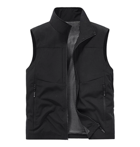 Detail view of black men's vest with zipper pockets and breathable mesh lining