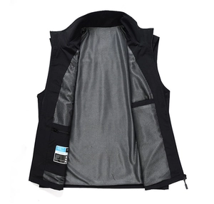 Detail view of breathable grey mesh lining and internal zipper pocket on black outdoor vest