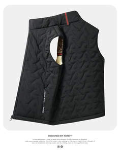 Detail of quilted vest with red and green stripe accents and INEW SPORT logo