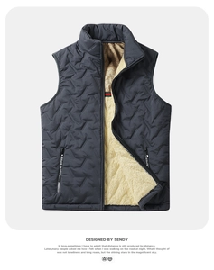 Detail of men's thermal vest showing zigzag quilted fabric and beige lamb wool lining