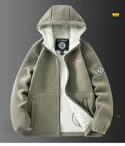 Detail of khaki polar fleece hooded jacket with warm lining and premium embroidered patches