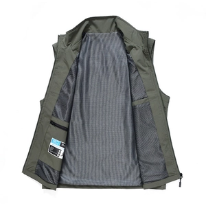 Detail of outdoor vest mesh lining with inner zipper security pocket and utility label