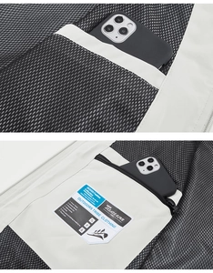 Detail of waterproof vest featuring breathable mesh lining and a secure zipper inner pocket