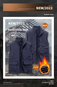 Detail of navy blue reversible vest showing smooth fabric and warm fleece texture