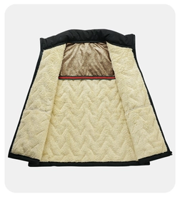 Detail of thermal graphene vest showing golden honeycomb lining and fleece interior