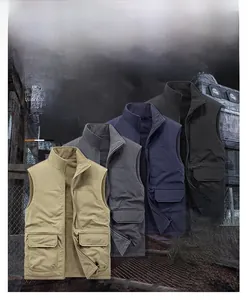 Detail of reversible workwear vest featuring fleece lining and multi-pocket utility design