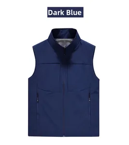 Detail of dark blue outdoor vest featuring breathable mesh lining and zippered side pockets