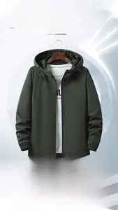 Detail of waterproof windbreaker jacket showing adjustable hood and elastic cuffs