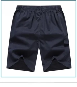 Detail of navy blue cotton cargo shorts showing elastic waistband and side flap pocket