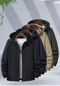 Detail view of water-resistant hooded jackets in black, navy, khaki, and green colors