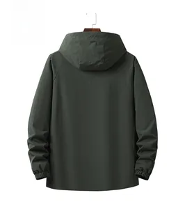 Back view of a men's dark green hooded windbreaker jacket with raglan sleeve design