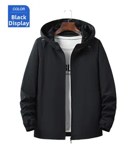 Detail of a black hooded windbreaker jacket featuring full-zip closure and elastic cuffs