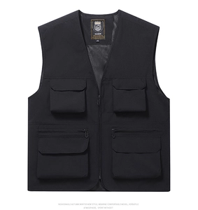 Detail of black outdoor vest featuring multi-functional pockets and breathable mesh lining