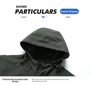 Detail of army green windbreaker hood with adjustable drawstrings and black mesh lining