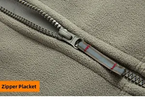 Macro view of zipper placket on fleece hoodie with reflective drawstring detail