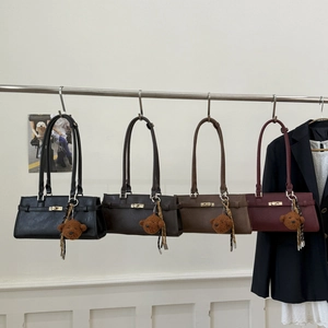 Retro oversized leather tote bags in four colors with bear charms and metal clasps