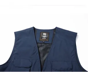 Detail of multi-pocket outdoor vest featuring breathable mesh lining and V-neckline