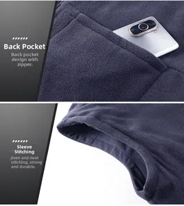 Detailed macro view of reversible vest featuring hidden zipper pocket and precision stitching