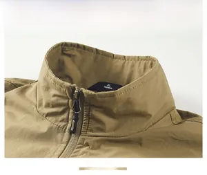 Detailed close-up of khaki multi-pocket vest collar with XL size tag and textured fabric